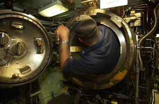 uss-portsmouth-submarine-interior-sailor.jpg